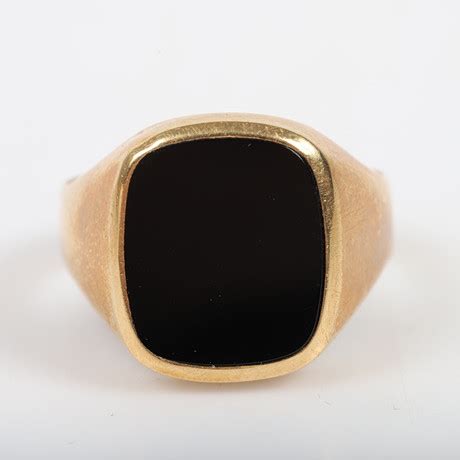 KLACKRING 18 K guld med onyx Smycken Ädelstenar Ringar Auctionet