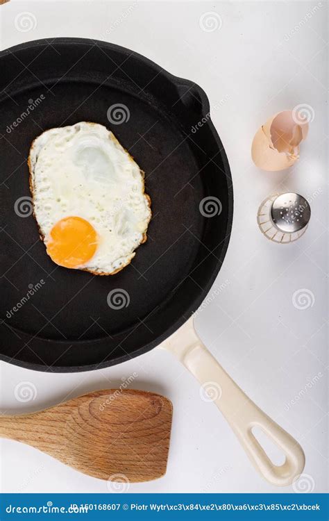 Tasty Fried Egg On A Cast Iron Pan Preparing A Tasty Breakfast Stock Image Image Of Eggs