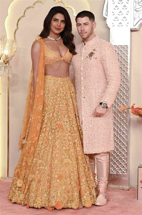 Nick Jonas And Priyanka Chopra Wear Ornate Garb At Ambani Wedding