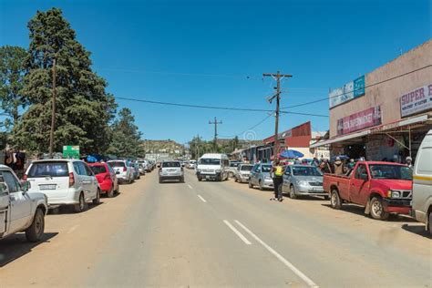 Street Scene with Businesses, Vehicles and People in Mount Fletcher ...