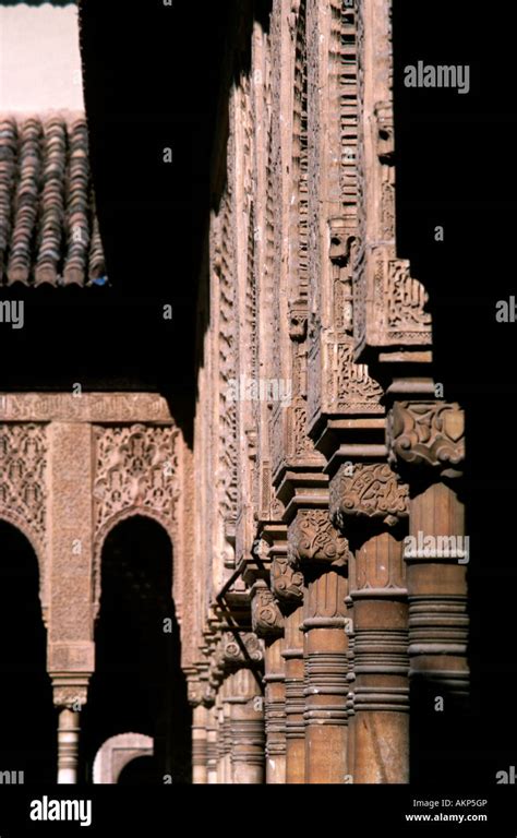 A Detail Of Carved Columns In The Patio De Los Leones Lion Court In The