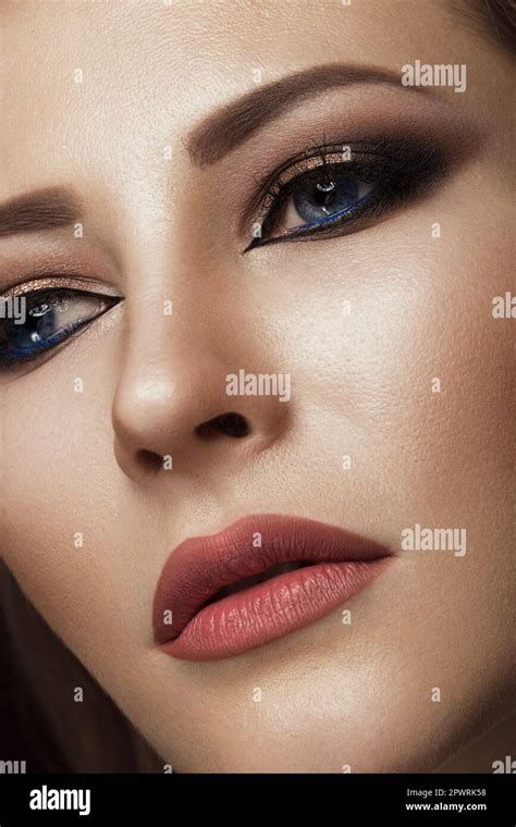 Beautiful Brunette Girl With Arabic Evening Make Up And Perfect Skin Beauty Face Close Up