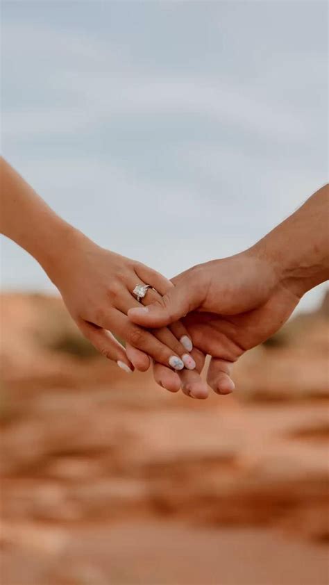 Emerald engagement ring hand couple photography inspiration | Couple ...