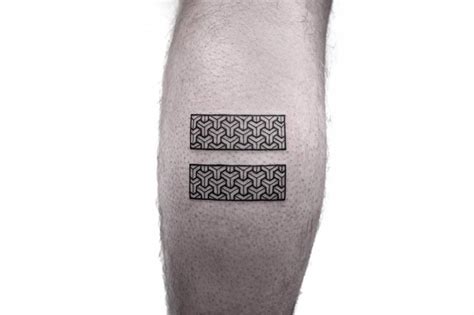 Geometric equal sign tattoo on the left calf.