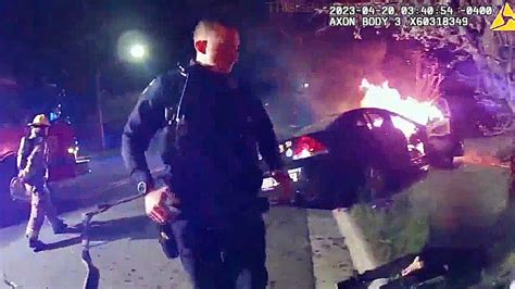 Body Cam Footage Captures Lansing Police Officer Pulling 3 People From