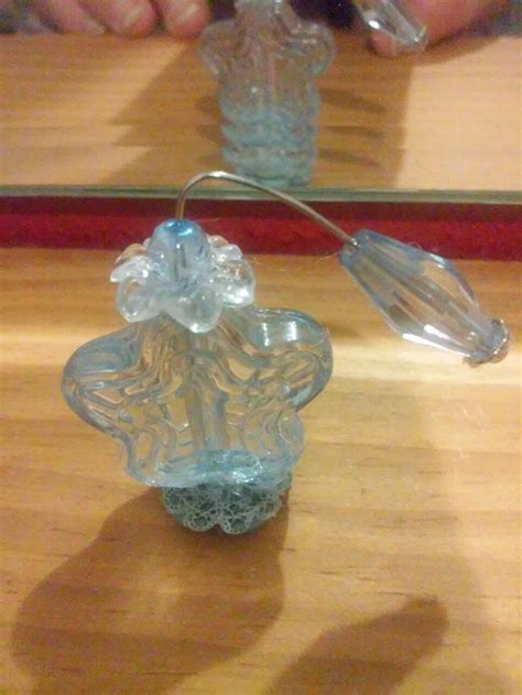 Light blue Star perfume bottle. | Perfume bottles, Jewelry crafts, Perfume