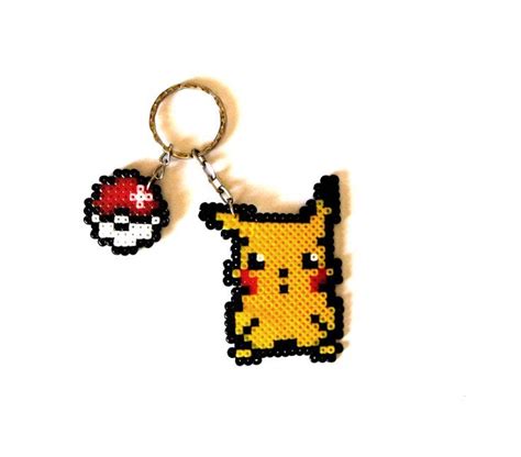 A Pixellated Keychain With A Pikachu On It