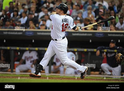 Minnesota Twins Designated Hitter Jason Kubel Hits A Solo Home Run