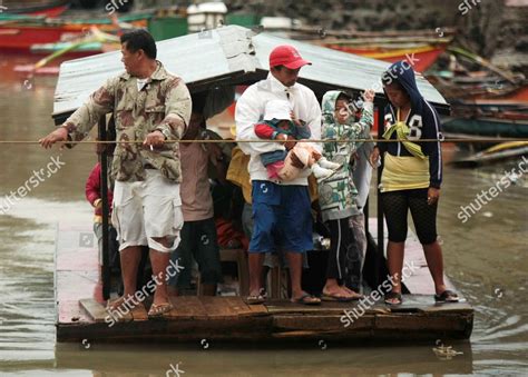 Filipino Residents Travel On Makeshift Raft Editorial Stock Photo