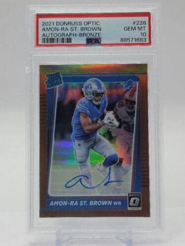 Amon Ra St Brown Donruss Optic Rated Rookie Bronze Rc Auto Psa