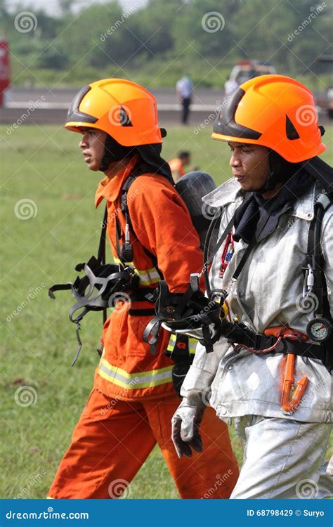 Firefighter Drills On Ladder Use With Ladder Truck Editorial Photo