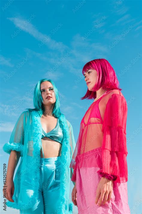 Gen-z Women with Dyed Hair Pose in front of Sky Stock Photo | Adobe Stock