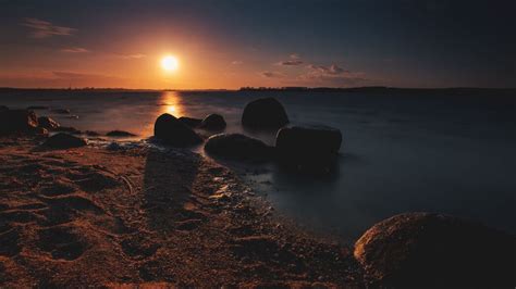 海岸日落美景，大海余晖映辉4k超清壁纸，3840x2160高清大图，一键下载！ 墨鱼部落格