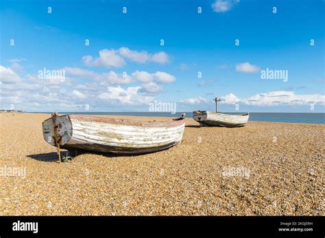 Two Old Clinker Built Fishing Boats Rotting On Aldeburgh Beach Hi Res