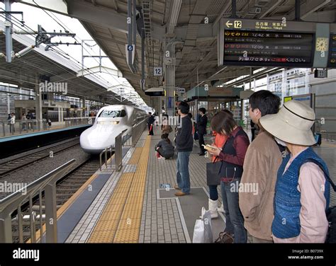 Passengers Waiting Board Approaching Shinkansen Hi Res Stock