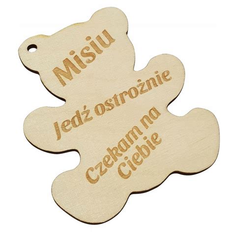 Two Wooden Tags With German Words On Them