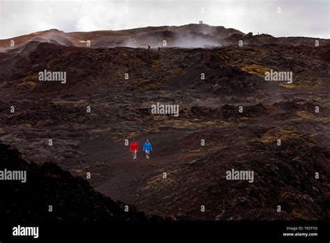 tourists at the Krafla volcano, Iceland, Krafla Stock Photo - Alamy