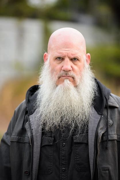 Premium Photo Portrait Of Man Standing Outdoors