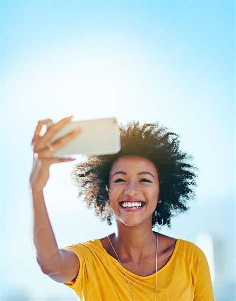 Premium Photo Selfies In The Sunshine Cropped Shot Of An Attractive