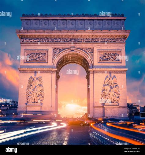 View Of Famous Arc De Triomphe At Sunset Paris Stock Photo Alamy