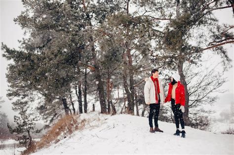 Free Photo | Loving couple walking in a winter park