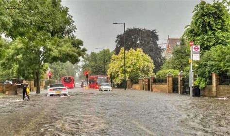 London flooding: London hit with torrential downpours as city flooded ...