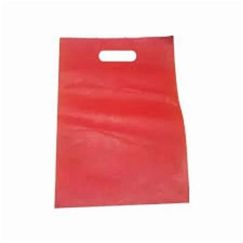 Plain Red D Cut Non Woven Bag For Grocery Capacity Upto 5 Kg At Rs