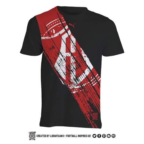 A Red And Black T Shirt With An Image Of A Soccer Ball On It