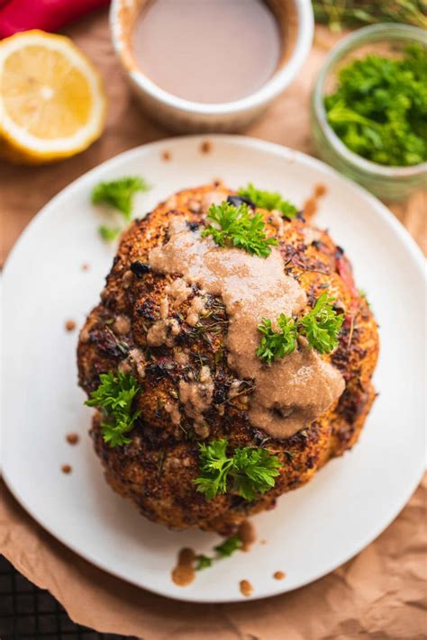 Whole Roasted Cauliflower With Tahini Sauce Earth Of Maria