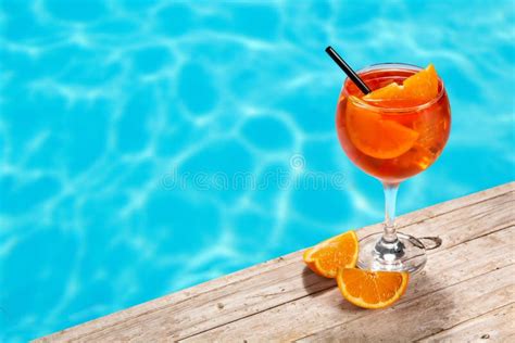 Glass Of Aperol Spritz Cocktail And Swimming Pool Stock Photo Image