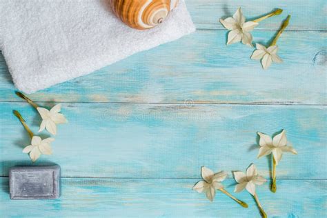 Spa Set With Sea Shells And Salt On Blue Wooden Old Background Sea