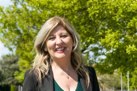 Happy Mature Blonde Woman Smiling On The Park Stock Image Image Of Nature Blond