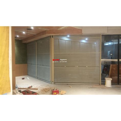 Pemasangan Rolling Door One Sheet Full Perforated Di Mako Suncity Mall