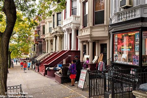 Harlem Street Scene - Framed Photograph by Andrew Prokos