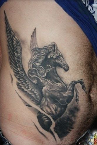 Nice dark horse pegasus with wings tattoo on ribs - Tattooimages.biz