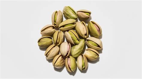 Premium Photo Pistachio Nuts Isolated On A White