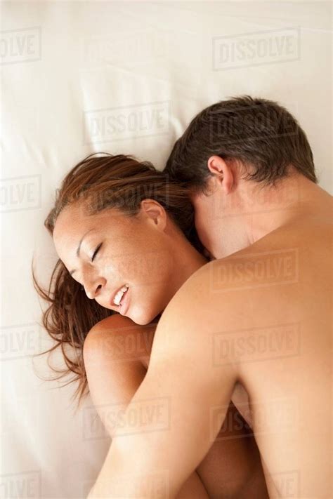 Nude Couple Kissing In Bed Stock Photo Dissolve