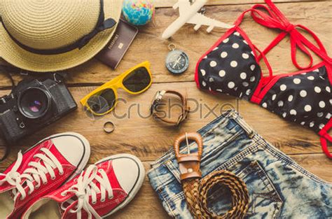 Beauty Colorful Bikini And Accessories On Wooden Floor Stock Photo