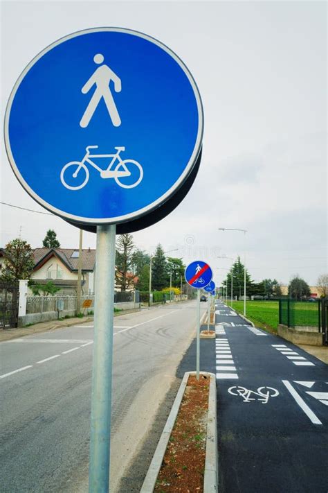 Bicycle And Pedestrian Shared Route Sign Stock Photo - Image: 30262720