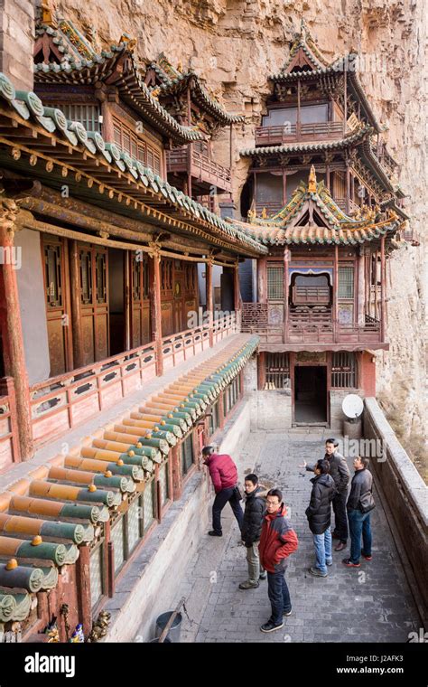 China, Shanxi Province, Tour group walking inside Hanging Palace ...