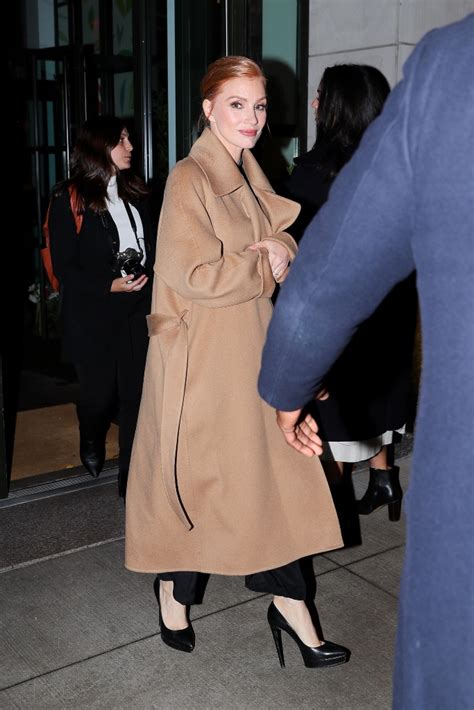 Jessica Chastain Soars In 5 Inch Heels With Wool Coat And Black Trousers