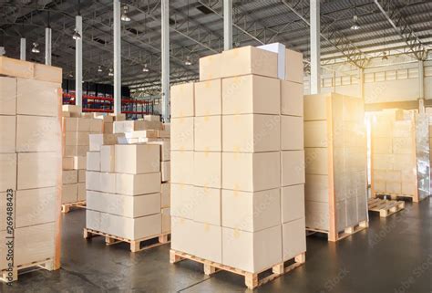 Packaging Boxes Stacked on Pallets in Storage Warehouse. Cardboard ...