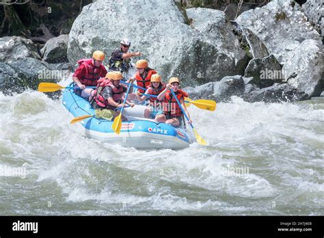 A Group Of People White Water Rafting Pacuare River Turrialba Costa