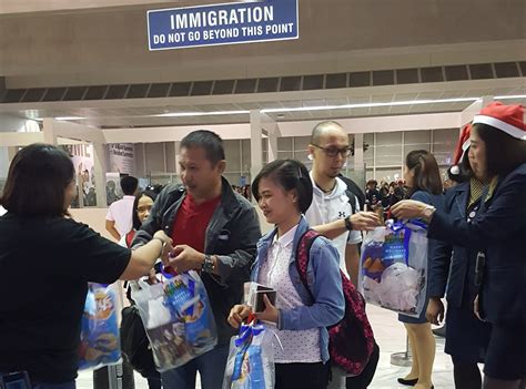 Globe, PAL, MIAA spread cheer to arriving OFWs, tourists with special