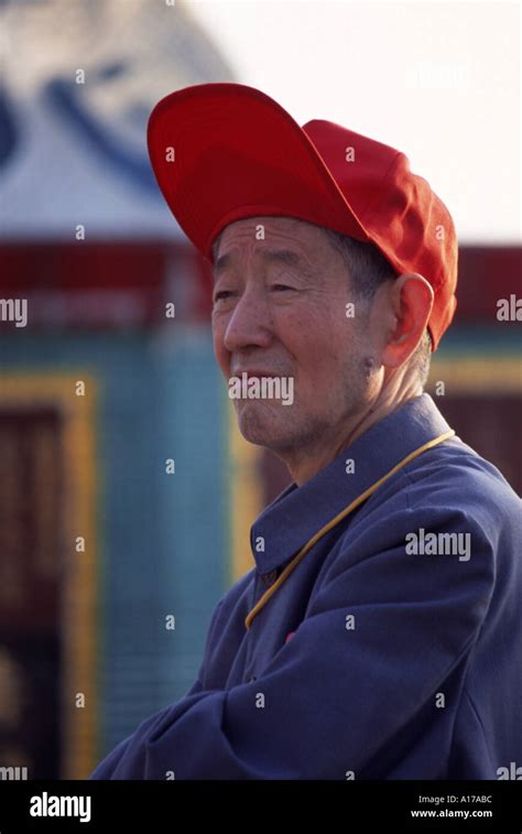 Old Chinese Man With Red Cap Looks On Stock Photo Alamy