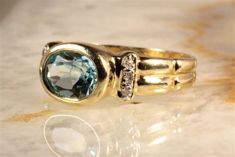 Ring Blautopas 6 Brillanten Gold 585 Second Hand Schmuck