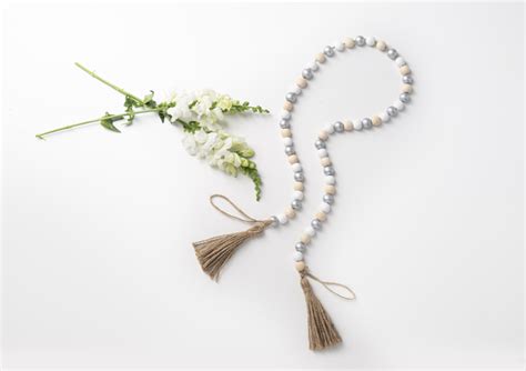 Wholesale Silver Natural White Wood Beaded Garland With Tassel Ganz