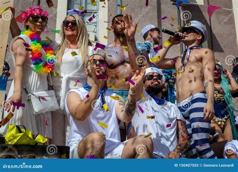 Gay Pride Crowd Of Protesters Parade With Wagons Editorial Stock Photo