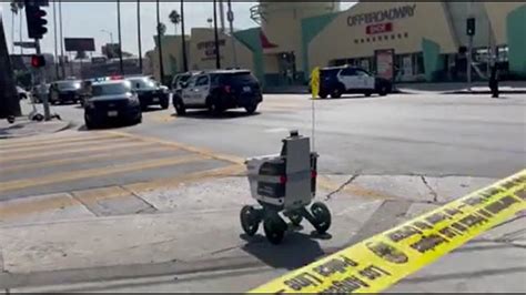 Delivery Robot Drives Through Crime Scene YouTube