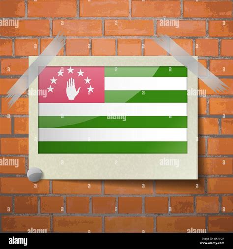 Flag Of Abkhazia Flat Design Scotch Taped To A Red Brick Wall Stock